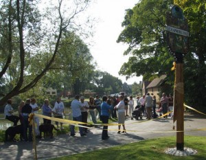 The residents wait for the unveiling of the sign